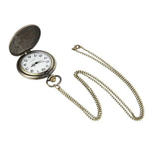 The Dragon Pocket Watch features an open antique brass design with a white face, black numbers, and a long metal chain, displayed on a white background.