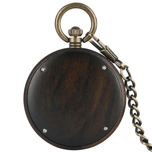 A vintage wooden pocket watch with a marble stone dial, quartz movement, and attached brass chain.