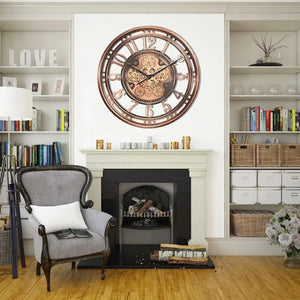 Above the fireplace in the living room hangs a Steampunk Wall Clock featuring exposed gears, bordered by bookshelves on either side. A cushioned armchair sits on the wooden floor, contributing to the room's industrial atmosphere.