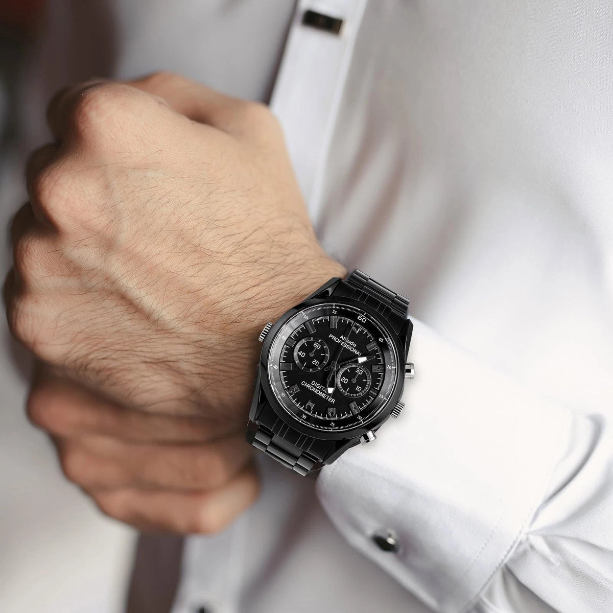 A person in a white dress shirt adjusts their cuff, subtly revealing the Watch SpyCam—a sleek spy watch with a hidden camera—on their left wrist.