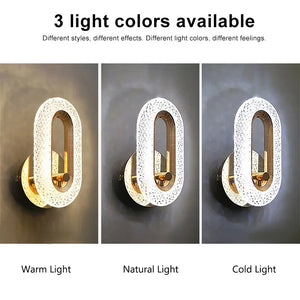 Three stylish Luxury Wall Sconces offering three distinct light color options: Warm Light, Natural Light, and Cold Light. These oval-shaped frames feature a textured surface. Text reads "3 light colors available." Enhance your indoor lighting with this sleek LED wall sconce.