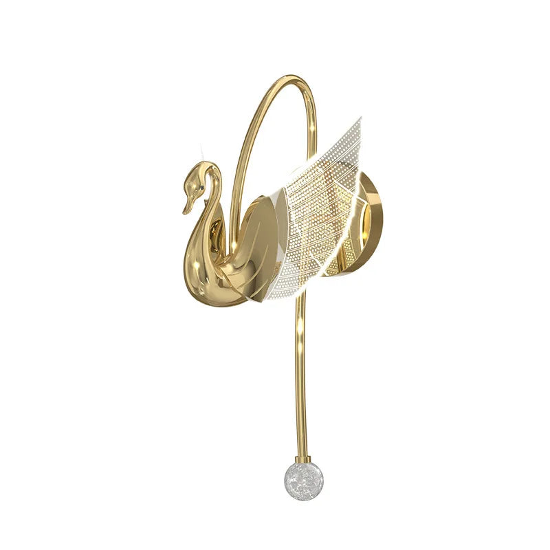 The Swan Wall Light is a decorative wall sconce featuring a graceful swan shape with a curved neck, transparent wing-like details, and a hanging crystal ornament that offers elegant indoor lighting.