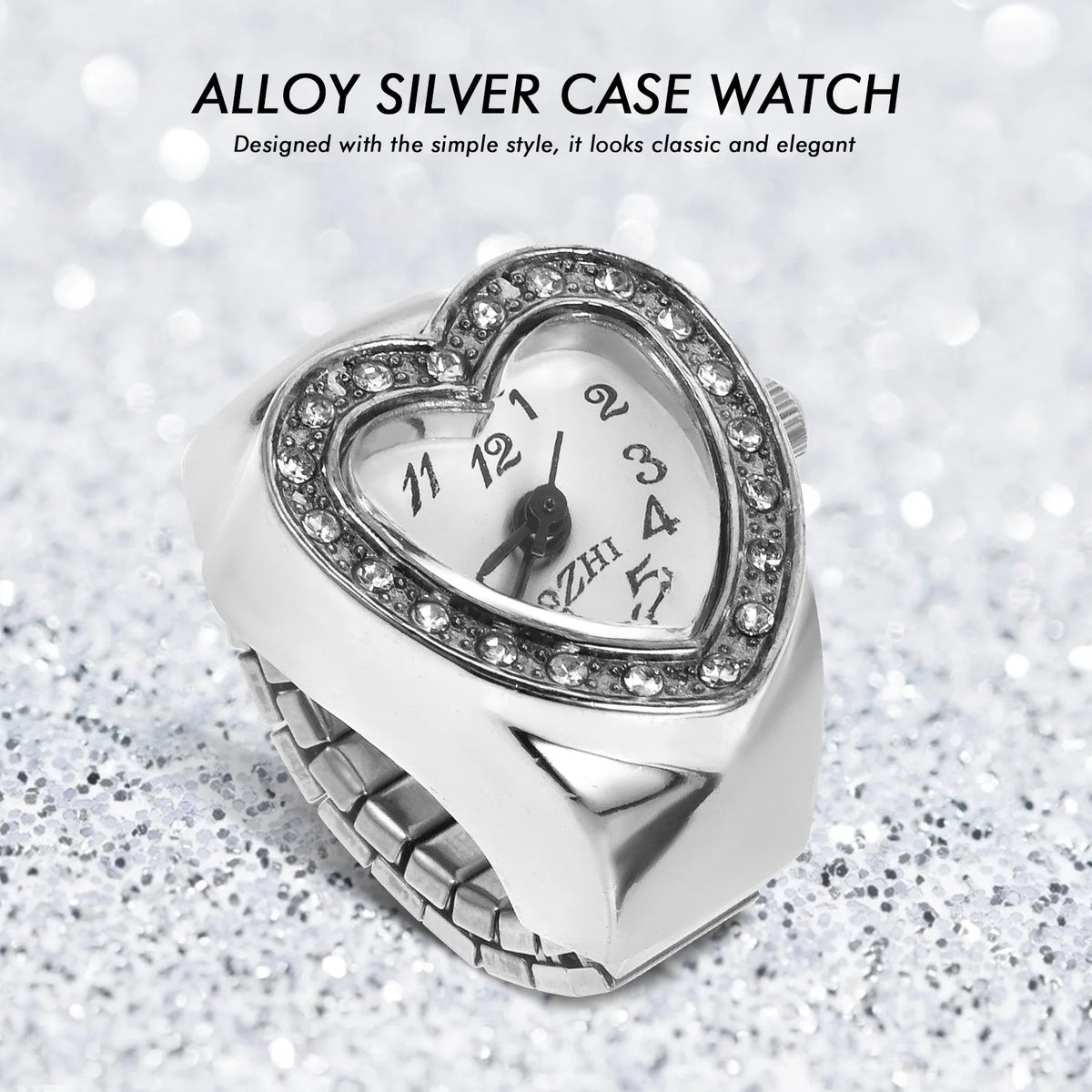 The Sweetheart Ring Watch features a heart-shaped design with a rhinestone border and glittery silver background. This alloy silver case timepiece is both classic and romantic—ideal for fans of elegant rhinestone jewelry.