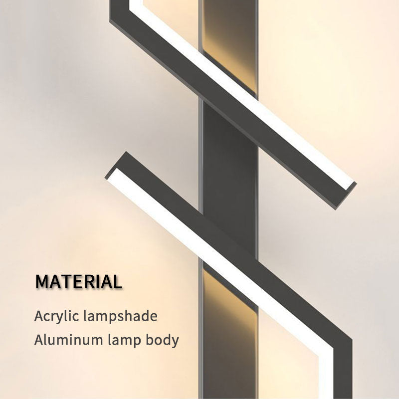 Close-up of the Minimalist Wall Sconce, featuring a diagonal linear design with white acrylic lampshades and an aluminum body. Text highlights the materials used.