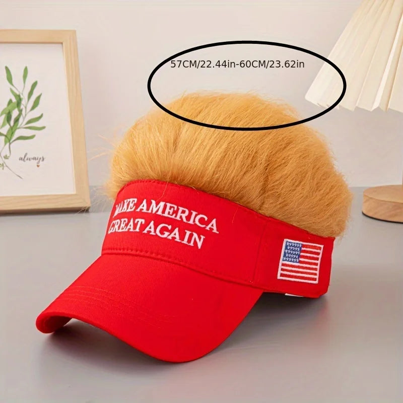A humorous red "Visor Cap - Make America Great Again" with attached fake blond hair rests on a table, while a black oval above shows the cap's size.