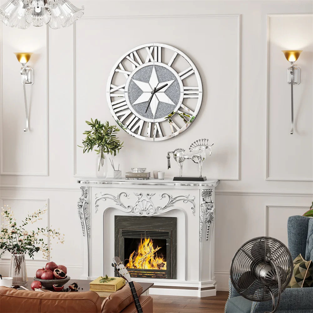 A white ornate fireplace with a fire burns beneath the Astral Chic Roman Wall Clock, which features an open-frame design and a striking crushed glass center, in a cozy living room decorated with plants and glassware.