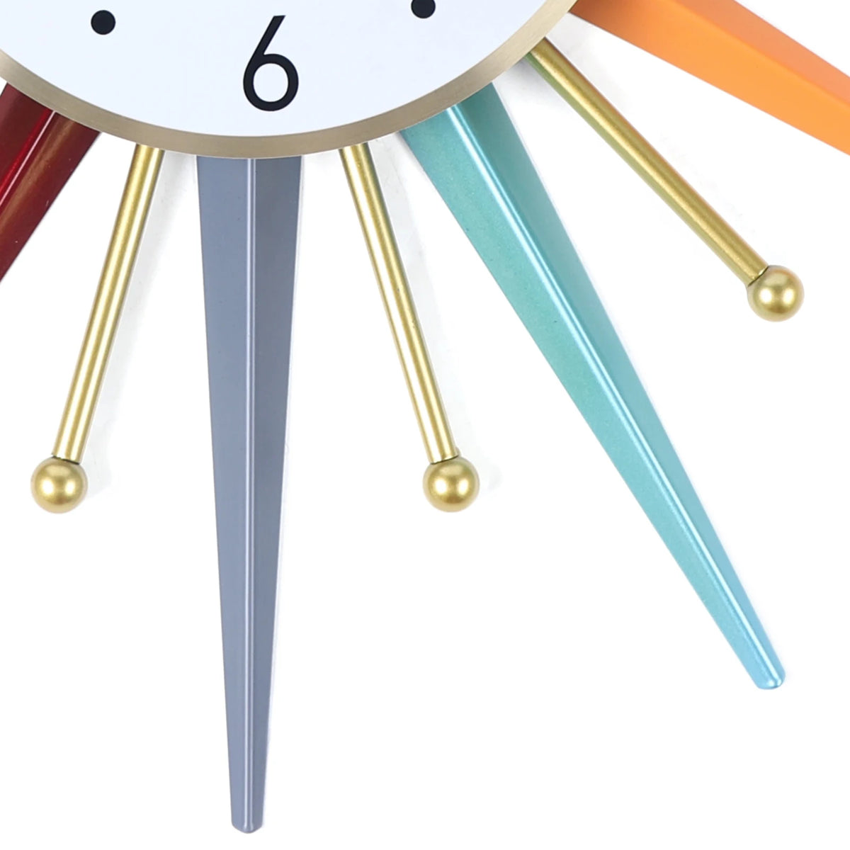Close-up of the Sunburst Wall Clock, featuring colorful rays and gold accents, with part of the number six visible on the clock face.