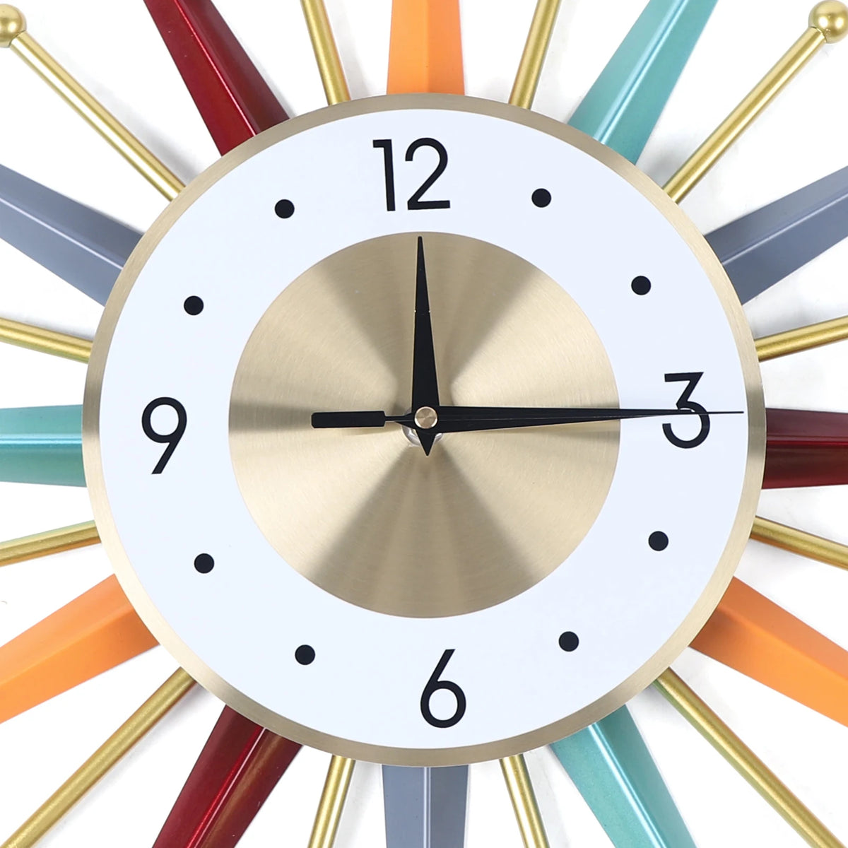 The Sunburst Wall Clock features a brass center, white face with black numbers, and colorful rays as hour markers, displaying the time as 9:15.