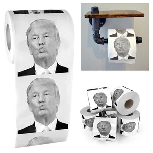 Trump Toilet Paper features repeating black-and-white Donald Trump faces on each sheet, available in multiple rolls—perfect for adding a humorous, satirical twist to your bathroom.
