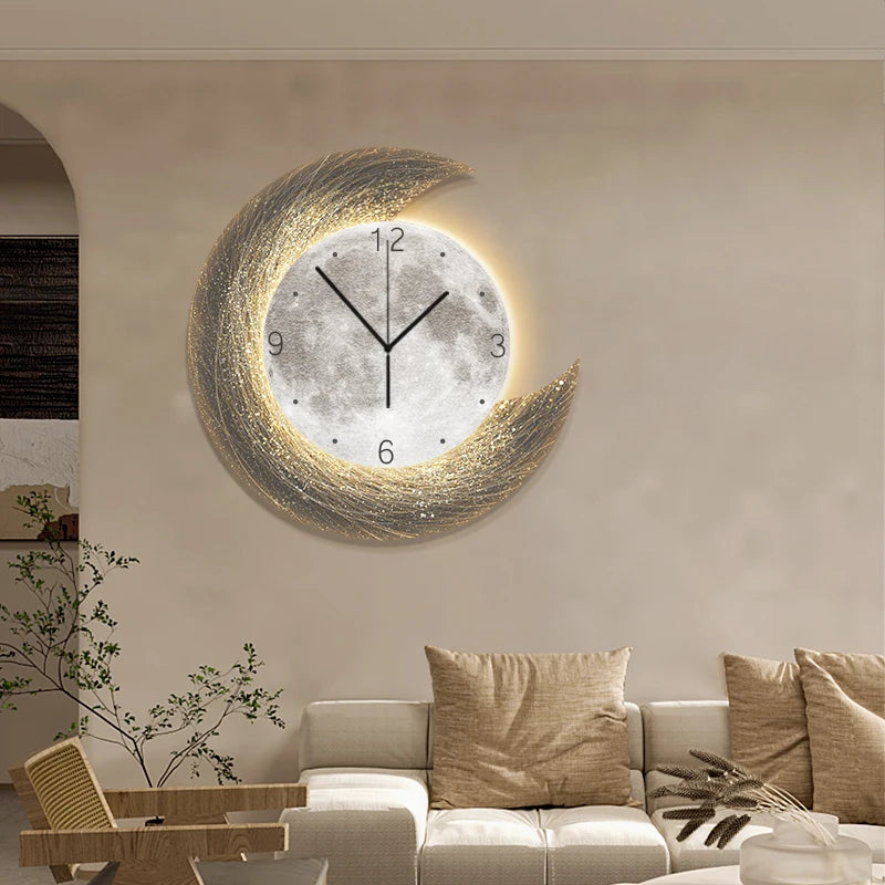 The Concentric Orbit Minimalist Wall Clock hangs above a beige sofa with tan cushions, adding modern statement lighting and style to this contemporary living room.