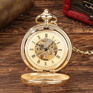 The Golden Roman Pocket Watch, featuring a visible gold skeleton movement and Roman numeral hour markers, is displayed open on a wooden surface.