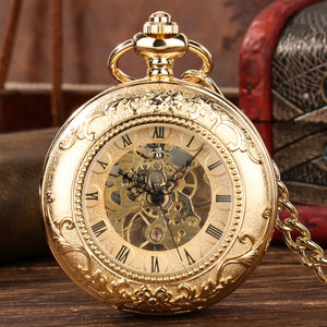 The Golden Roman Pocket Watch, featuring Roman numerals and ornate engraving, rests on a wooden surface with part of its chain visible.