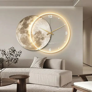 A modern living room highlights a couch, a round coffee table, and the Celestial Wall Clock Light with its large illuminated circle and moon motif, adding unique home decor that embraces cosmic imagery.