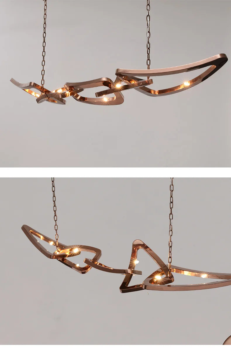 Two images display the Elegant Industrial Gallery Pendant—an LED light with abstract, twisted metallic shapes and integrated bulbs, suspended from the ceiling by two chains.