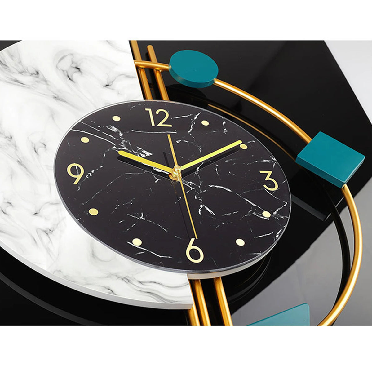 The Modernist Constellation Accent Clock features a black marble-patterned face with gold hands and numbers, set against a backdrop of gold and teal geometric accents—a striking statement piece for any stylish space.
