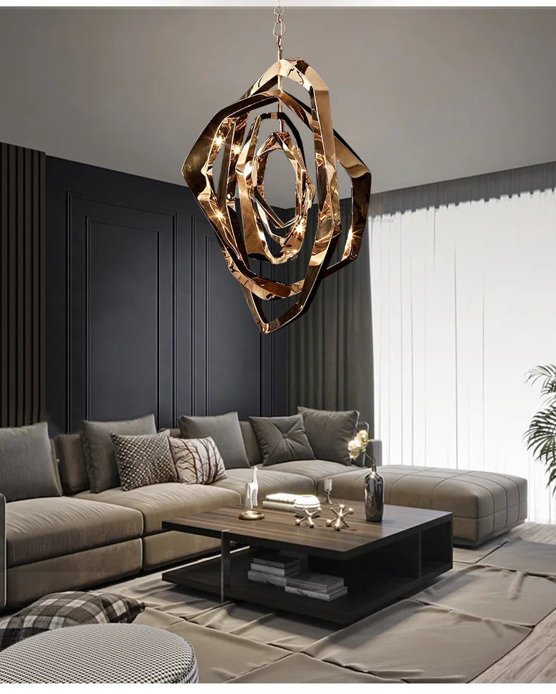 Modern living room with a neutral-toned sectional, black coffee table, and the Elegant Industrial Gallery Pendant LED light overhead. A large window with sheer curtains fills the space with brightness.