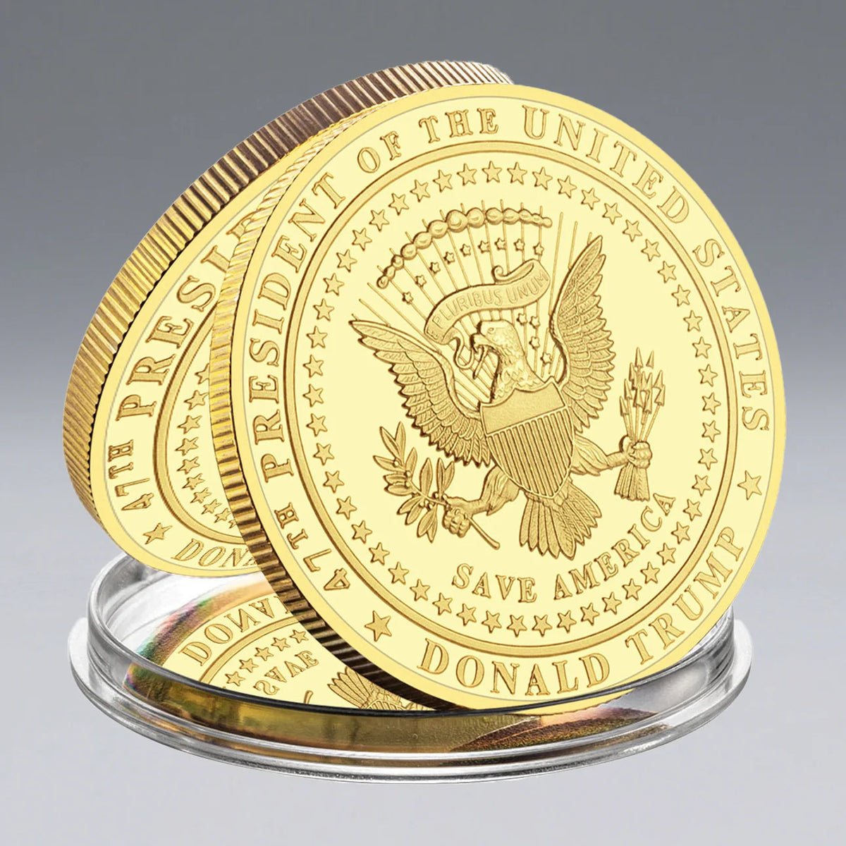 The Trump Commemorative Coin is a gold-colored piece featuring the Great Seal of the United States with "Save America" and "45th President" inscriptions, part of the Save America Legacy Collection.