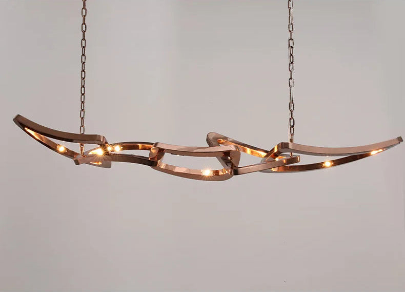 The Elegant Industrial Gallery Pendant, a modern abstract light with integrated LEDs, hangs from two ceiling chains against a plain background, creating a striking focal point.