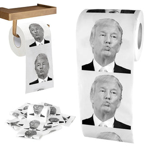Trump Toilet Paper features repeated black-and-white images of Donald Trump’s face on each sheet. Displayed on a holder and in rolls, it offers a humorous touch to your bathroom décor.