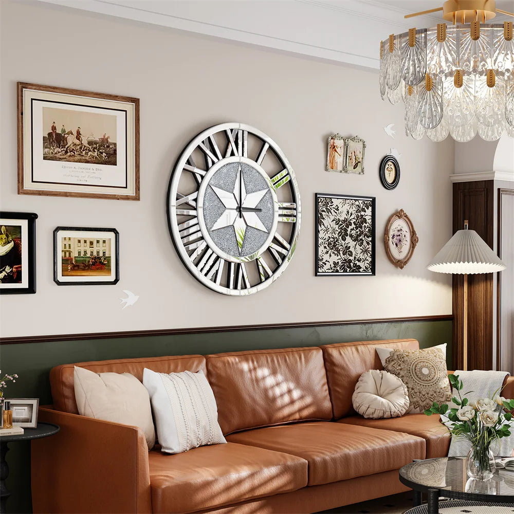 A living room with a brown leather sofa, wall art, and the Astral Chic Roman Wall Clock—an open-frame silvery clock with Roman numerals and a star motif—mounted above the couch.