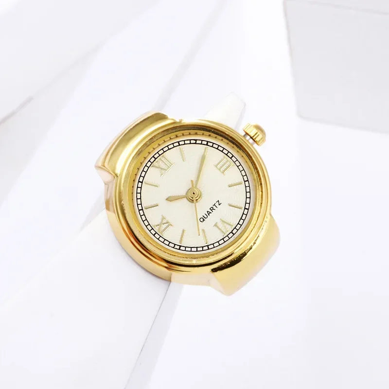 The Eternal Ring Watch is a gold analog quartz minimalist timepiece featuring a white face with gold hour markers, shown against a white background.