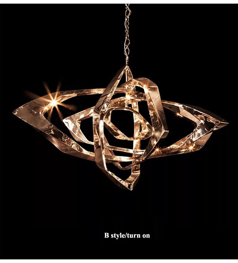 A modern Elegant Industrial Gallery Pendant in gold with geometric shapes hangs from a chain, illuminated against a black background. Text reads: "B style/turn on.