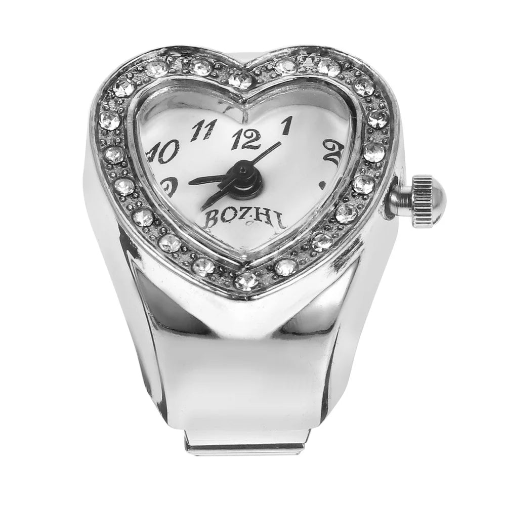 A romantic accessory, the Sweetheart Ring Watch features a silver heart-shaped design with rhinestones, black hour markers, and "BOZHI" branding—blending playful elegance with practical charm.