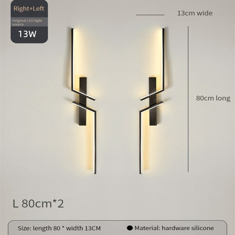 The Minimalist Wall Sconce features a geometric design, measuring 80cm long by 13cm wide. Made from hardware and silicone, each sconce has a modern look and uses an efficient 13W LED light source.
