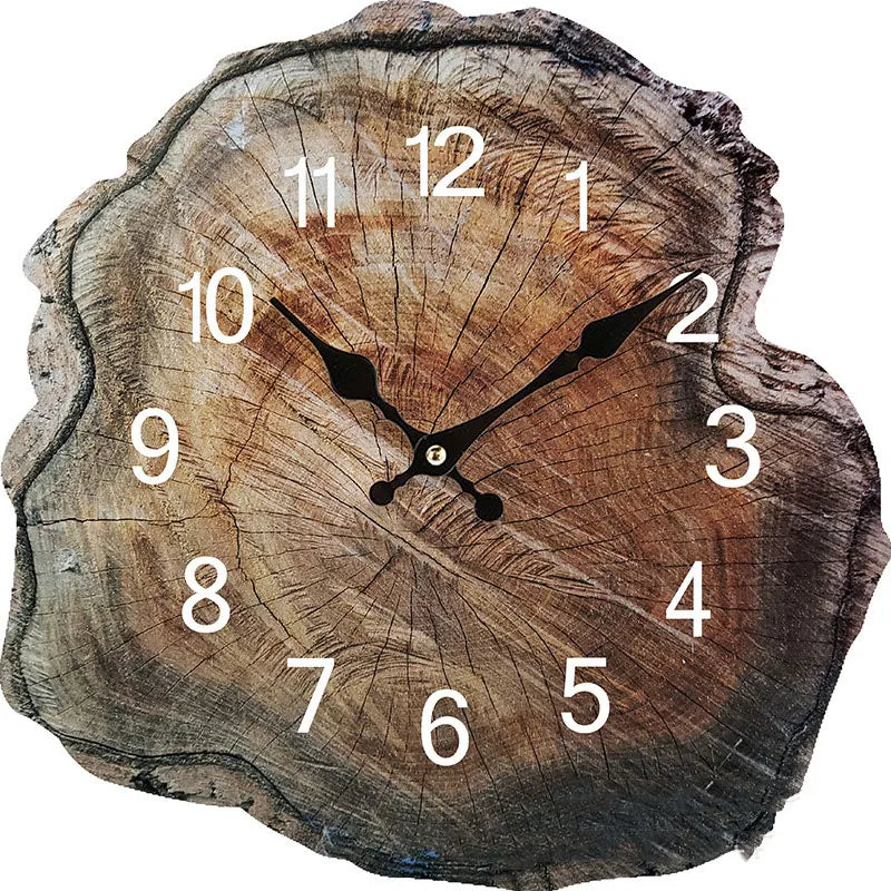 The Wooden Grain Wall Clock, featuring black hands and white numerals, elegantly rests on a wooden slab that resembles a tree cross-section, harmoniously combining modern design with natural charm.