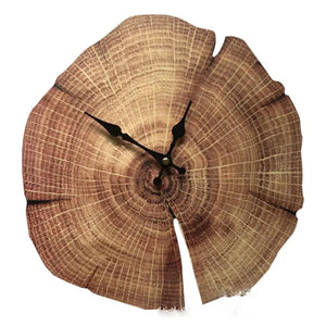 The Wooden Grain Wall Clock features a contemporary design reminiscent of a wooden tree slice, showcasing visible growth rings and sleek black hands to add an organic touch to any room.