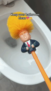 The Trump Tidy Toilet Brush features a caricature handle in a suit and yellow hair, perfect for keeping your bathroom clean.