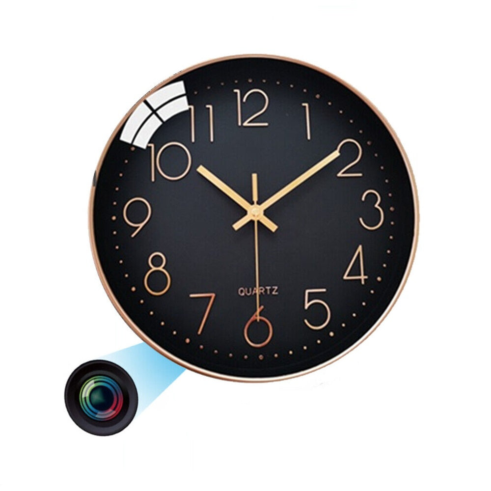 The Wall Clock SpyCam is a round black quartz wall clock that shows the time 10:08 and discreetly houses a hidden camera with HD 1080P resolution. An illustration indicates the camera lens and light beam located on the clock's lower left side, making it ideal for covert motion detection.
