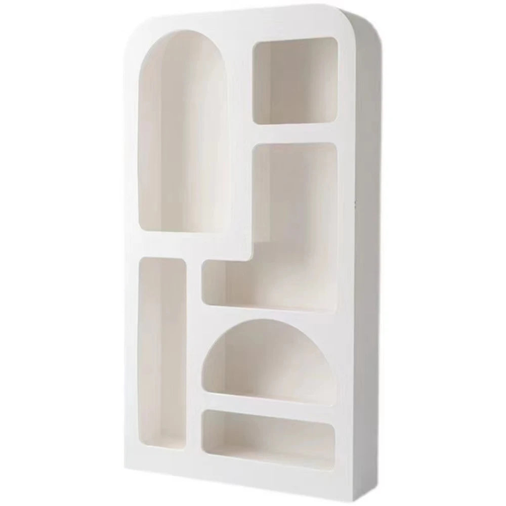 The Minimalist Cream Wind Sculptural Shelf is a white rectangular wall unit with multiple geometric compartments—ideal for modern interiors.