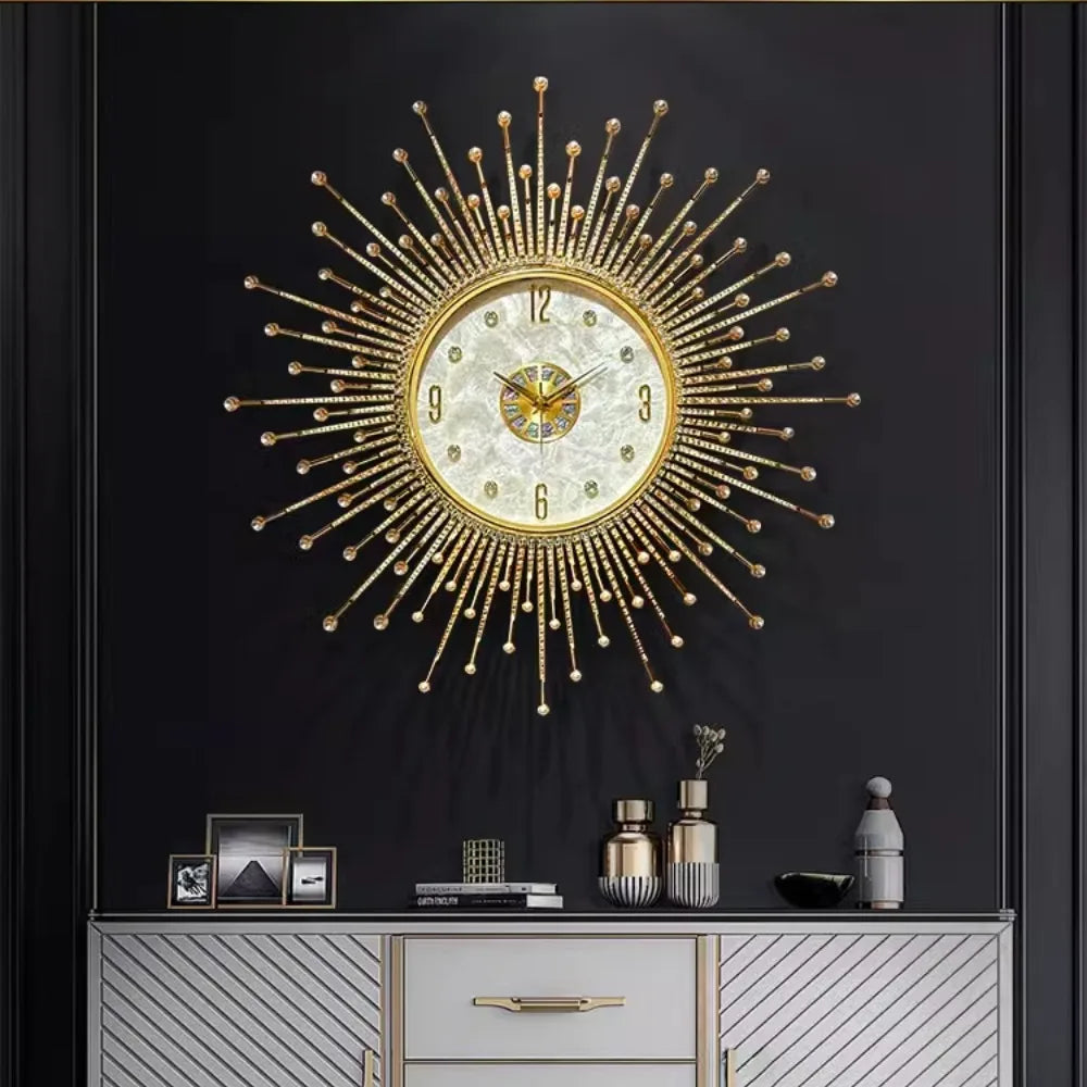 The Premium Sun Wall Clock with decorative rays shines above a dresser with ornaments, set against a dark wall.