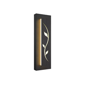 A rectangular black wall light with a vertical beam and cut-out leaf design, emitting a warm glow. This versatile Flower Wall Sconce is perfect for indoor and outdoor walls, offering waterproof durability to withstand any weather conditions.