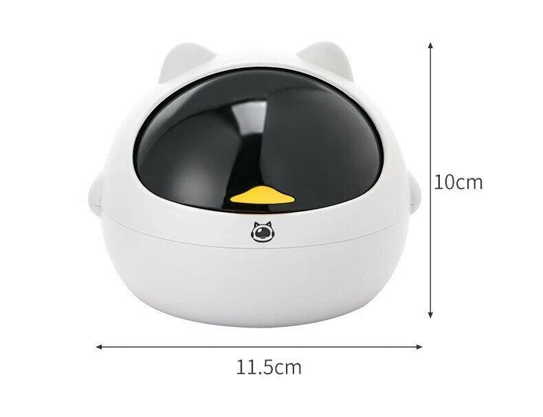 The Cute Display SpyCam is a white, kitty-shaped security camera container with a black lid and yellow button, measuring 11.5 cm wide and 10 cm tall—ideal for discreet home surveillance.