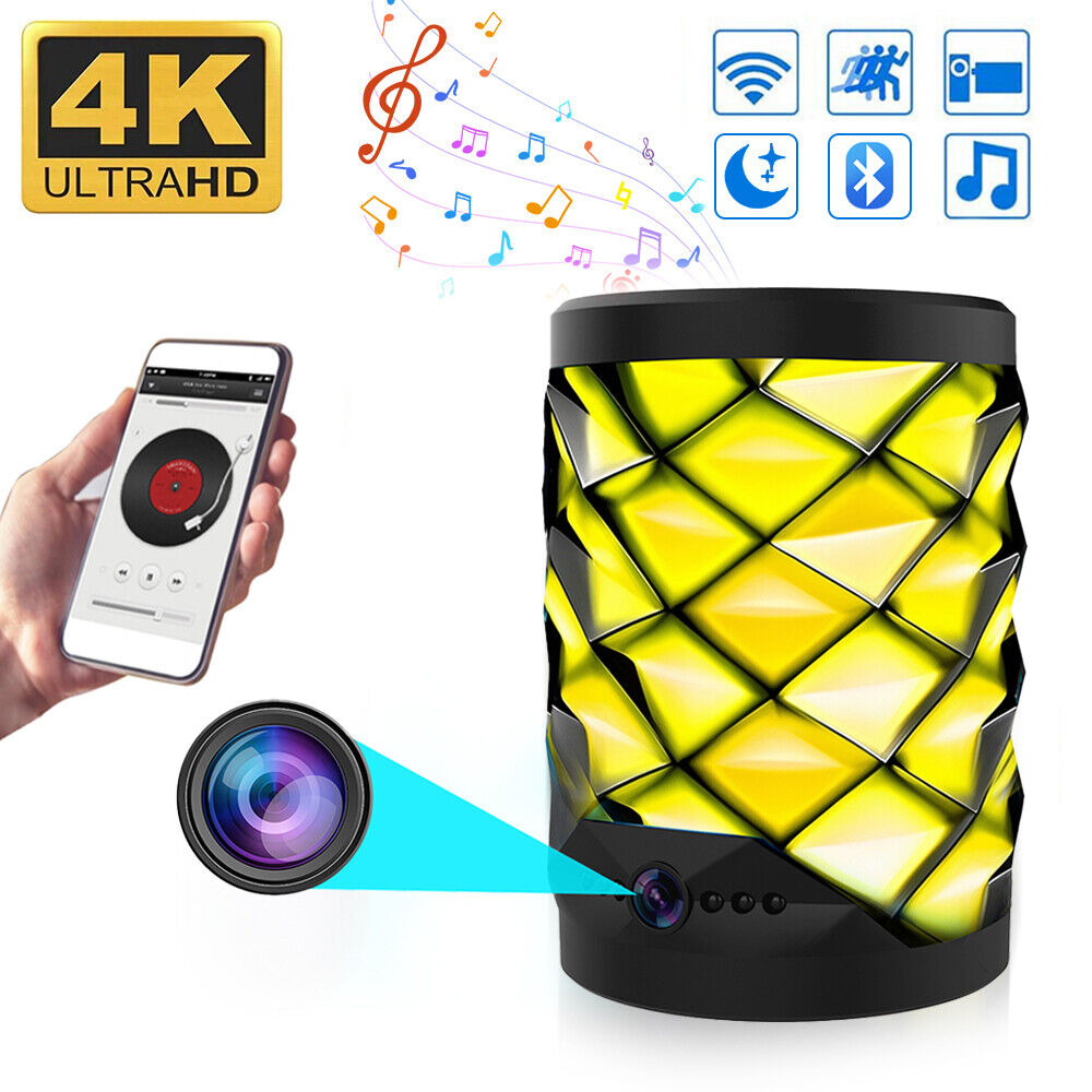 A smartphone operates the yellow diamond-patterned Bluetooth Speaker SpyCam, a covert 4K Ultra HD home monitoring device with music and feature icons, ensuring discreet 24/7 security.