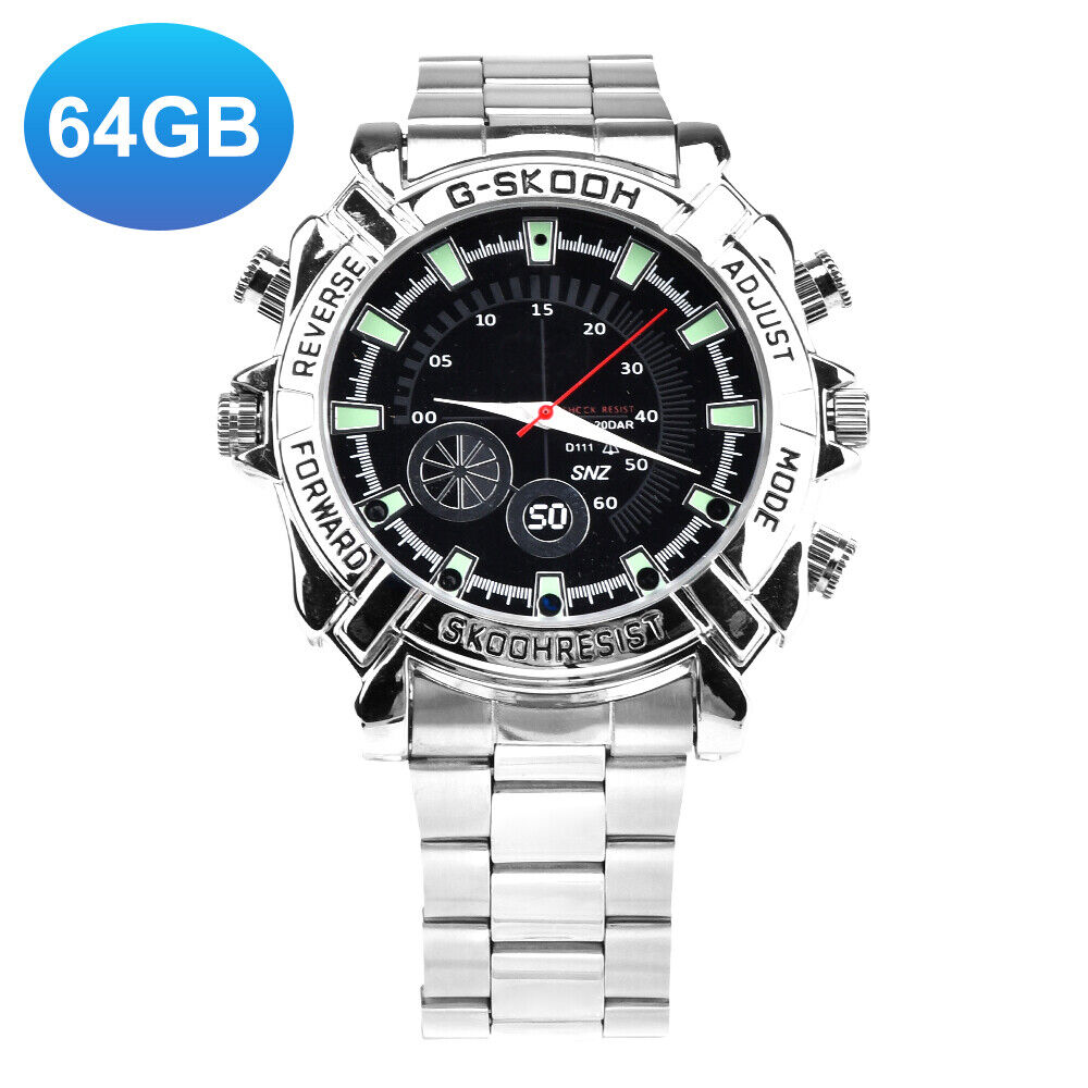 The Watch SpyCam is a sleek silver wristwatch with multiple labeled buttons, a black dial, "64GB" label in the top left, and a hidden SpyCam for discreet 1080P video and audio recording.