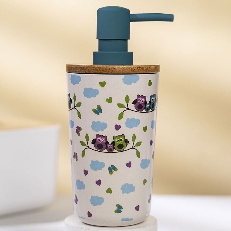 White soap dispenser with a teal pump features cartoon owls, hearts, and clouds on branches. It cleverly conceals a hidden camera, ideal for those who appreciate the Cute Decorative Display SpyCam in their home.