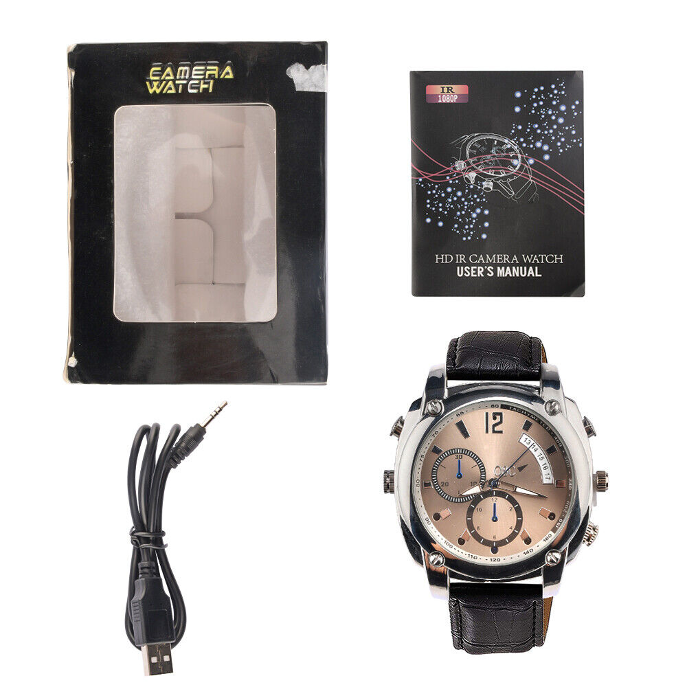 The Wristwatch SpyCam, featuring 1080P video, a brown leather strap, USB charging cable, black retail box, and user manual, is displayed on a white background.