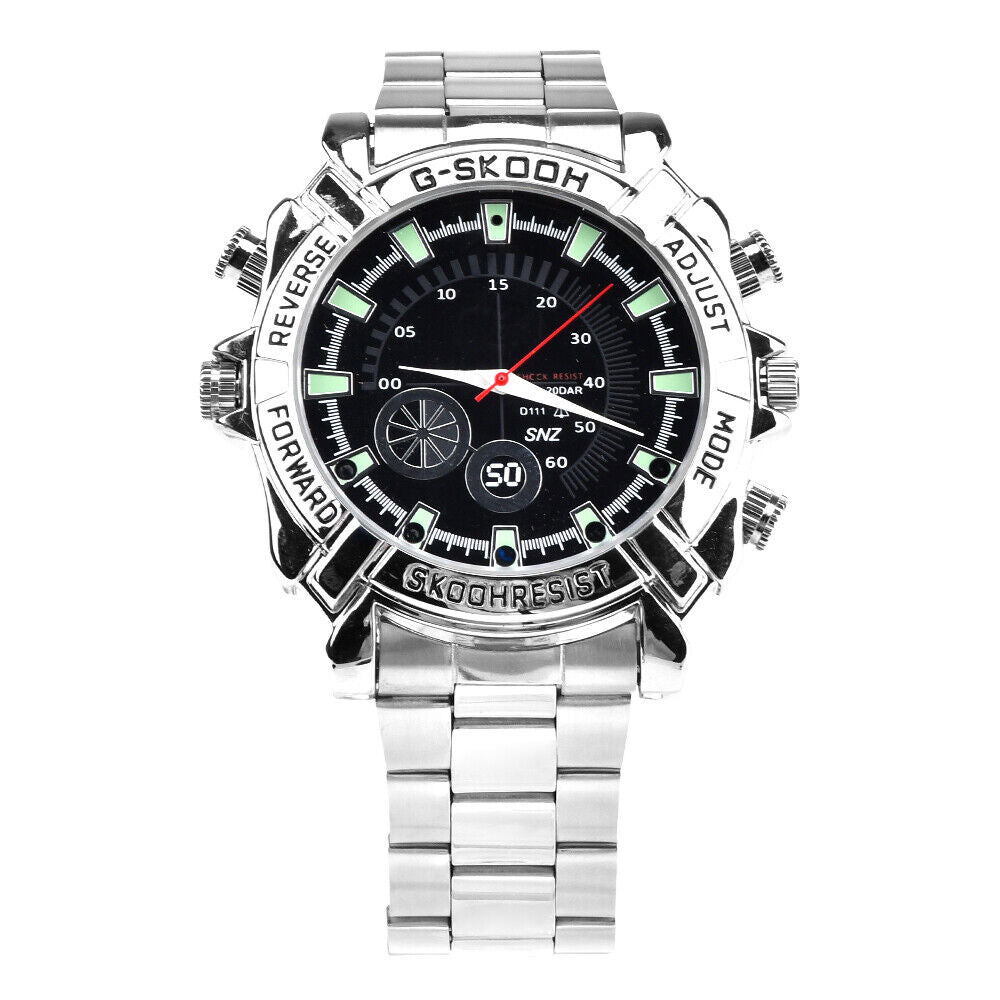 The Watch SpyCam is a silver wristwatch with a black round face, labeled bezel buttons, "G-SKOOH" at the top, and a polished stainless steel band. It discreetly records 1080P video and audio with a hidden camera.