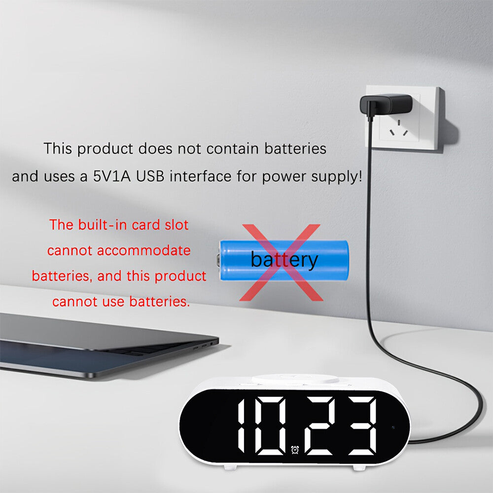 The Digital Clock Charger SpyCam plugs into a wall outlet using a USB cable; it does not use batteries and requires USB power. Displays time clearly with reliable wireless charging—no WiFi surveillance or hidden camera functions included.
