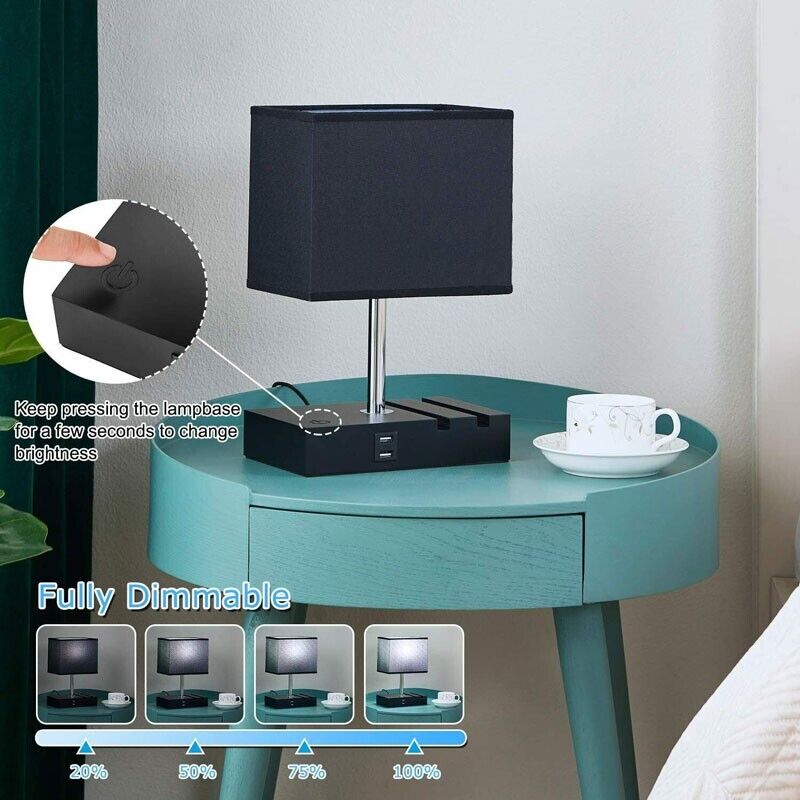 A Desk Lamp Charger SpyCam with USB ports sits on a round teal table, discreetly housing an HD 1080P camera for surveillance. A nearby white teacup and saucer add charm. Instructions guide dimming control, showing various brightness percentages.