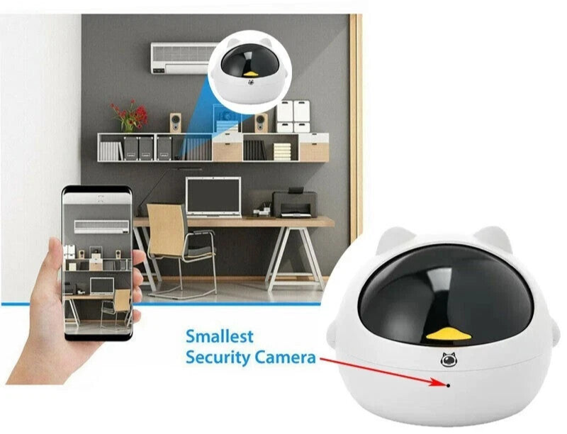 The Cute Display SpyCam, shaped like a kitty, discreetly monitors your home office, with clear surveillance footage viewable on your smartphone. Text reads: "Smallest Security Camera.