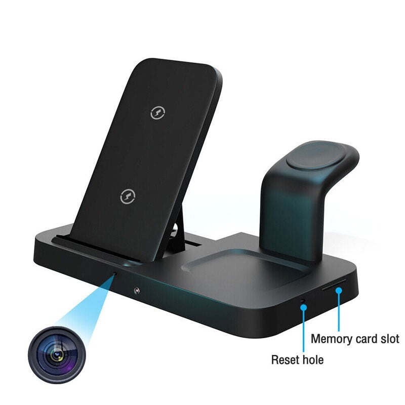 The Universal Charging Station SpyCam is a sleek black smart hub with multiple slots, including a smartphone stand and watch holder. It features a reset hole, memory card slot, and labeled directional lines, enhancing its function as both a charger and organized tech station.