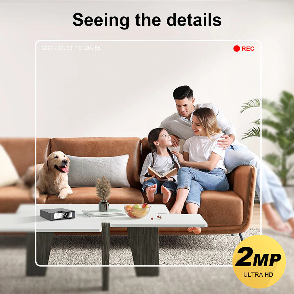 A family of three sits on a couch with their dog, recorded by the Wireless Charger Clock SpyCam featuring motion detection and 2MP Ultra HD recording, as shown in the image.