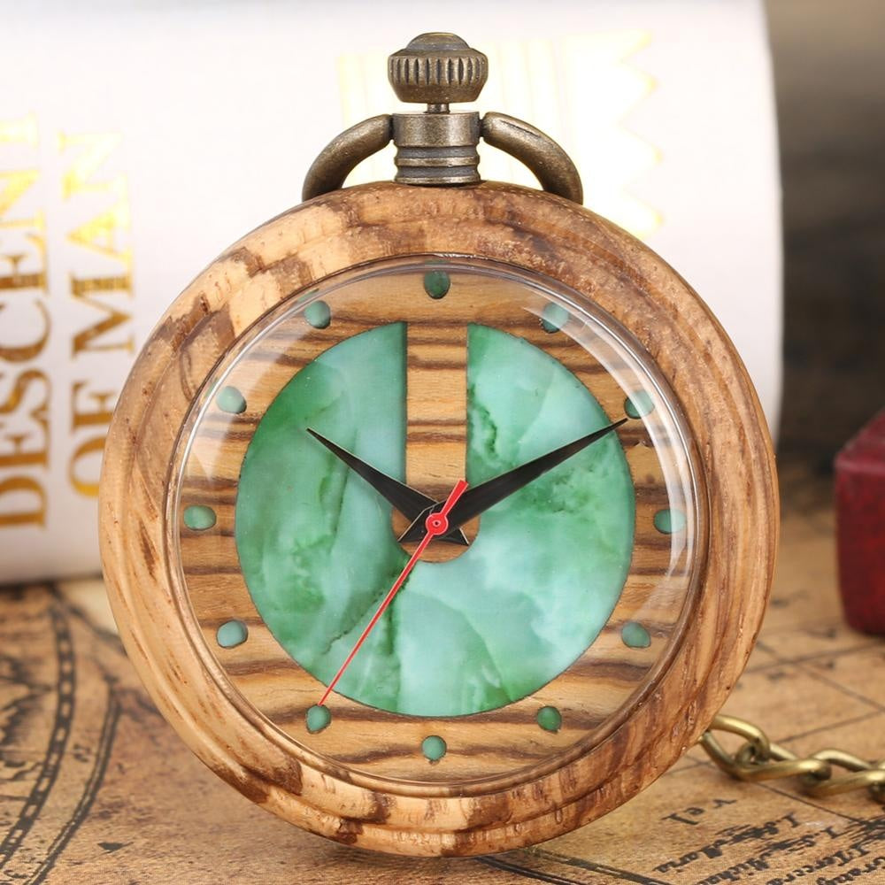 The Timeless Wooden Pocket Watch features a wood grain case, green stone face, gold accents, and three hands, creating a blend of modern vintage style and elegance—perfectly displayed on a vintage map background.