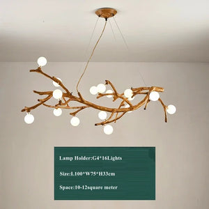 The Branch Pendant Light, featuring a branch-like design and elegant glass orb shades, offers gentle illumination. A sign below outlines the lamp holder, size, and space coverage, showcasing organic modern lighting.