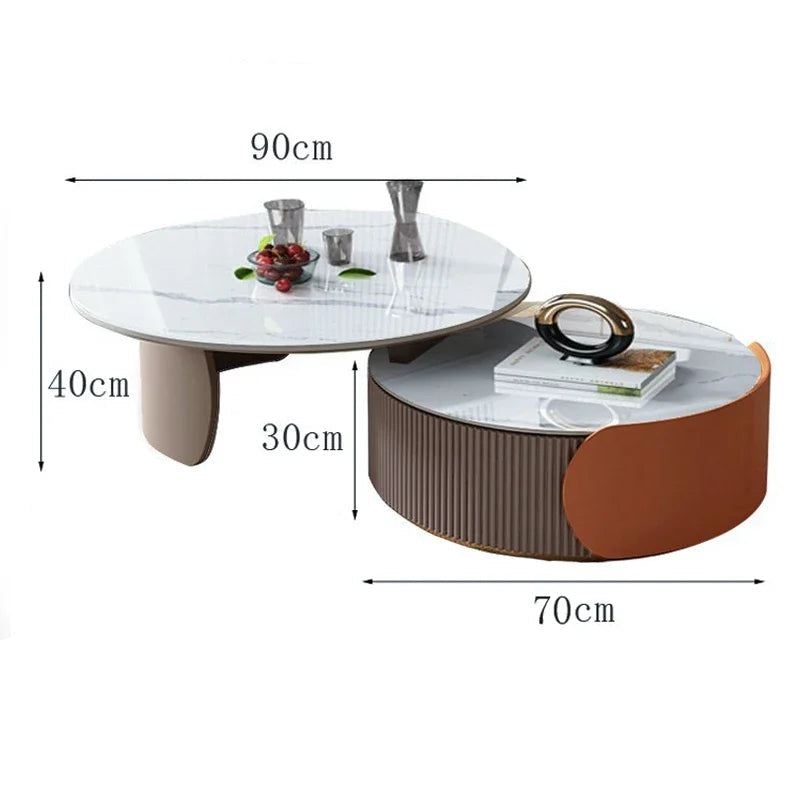 The Luxe Round Coffee Table set features two round nesting tables with white tops, sized 90x40 cm and 70x30 cm, ideal for stylish and versatile living spaces. Decorate with vases, fruit, or books to personalize your room.