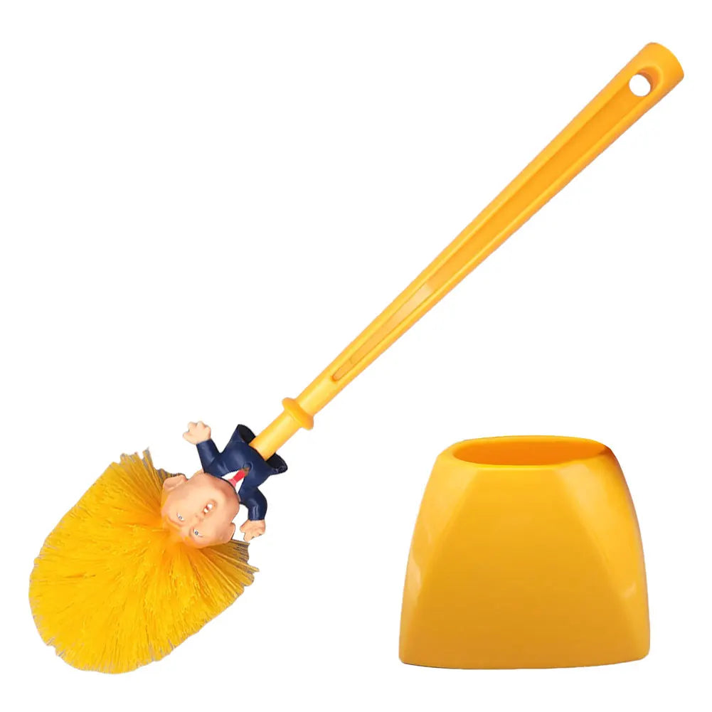 The Trump Tidy Toilet Brush features a handle styled like a suit-clad figure with yellow hair and a matching holder, making it a quirky novelty accessory that brings humor and fun to your bathroom cleaning routine.